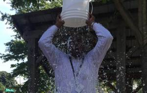 Superintendent Emmanuel Caulk started the school year with a photo op, and took the Ice Bucket Challenge to raise awareness of ALS. A couple months later he is dealing with an "unfounded" controversy over former Deering  football coach Matt Riddell.