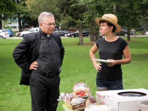 Fr. Mike Seavey and Meaghan Lasala at a free health care clinic hosted by the nurses union and Southern Maine Workers' Center.
