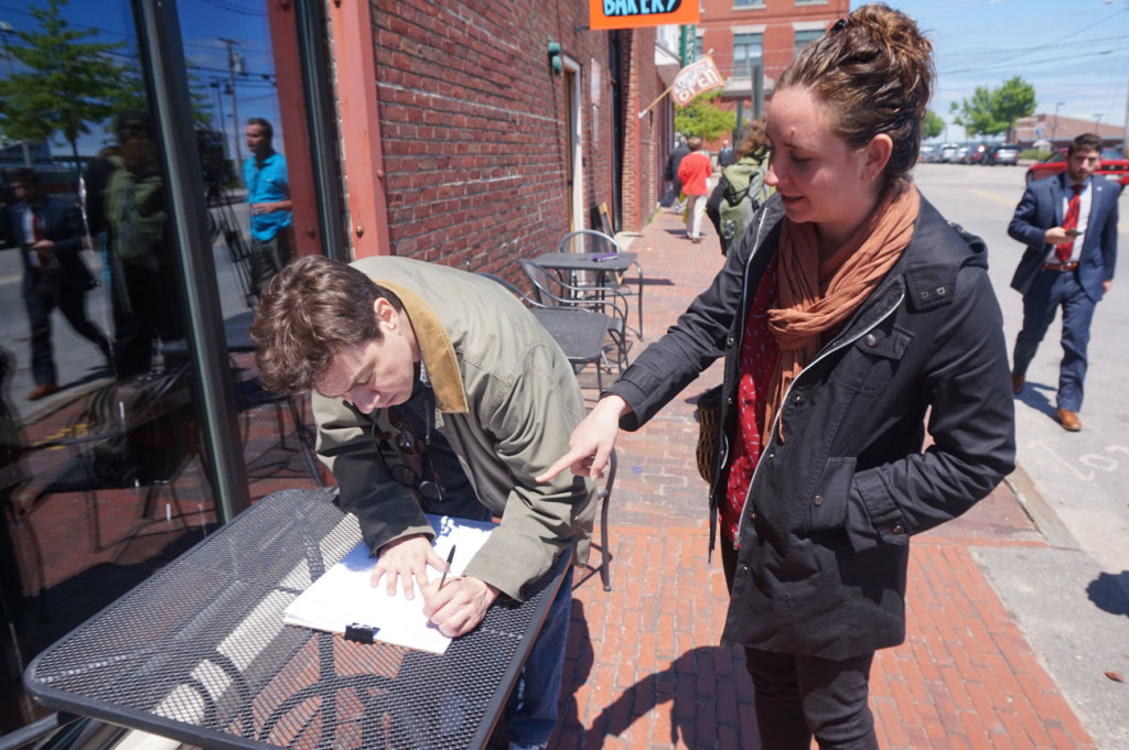 Brian Leonard of South Portland is among the first to sign to put a $12 minimum wage on the state ballot in 2016.
