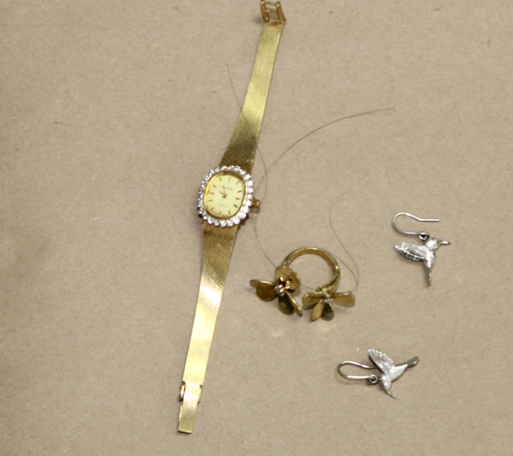Jewelry found on  unidentified woman. Courtesy of Portland Police.