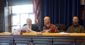 Dave Marshall chairing a Transportation, Sustainability and Energy Committee hearing. Councilors Hinck and Donoghue also pictured.