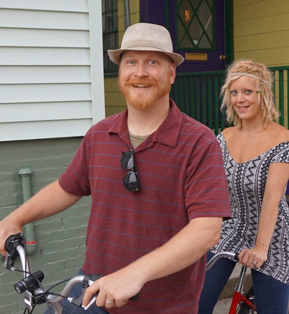 Dave Marshall and his wife Whitley on their tandem bike in front of their West End home.