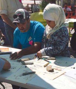 West End News - Calligraphy - Ahmad Alzubaidi and daughter