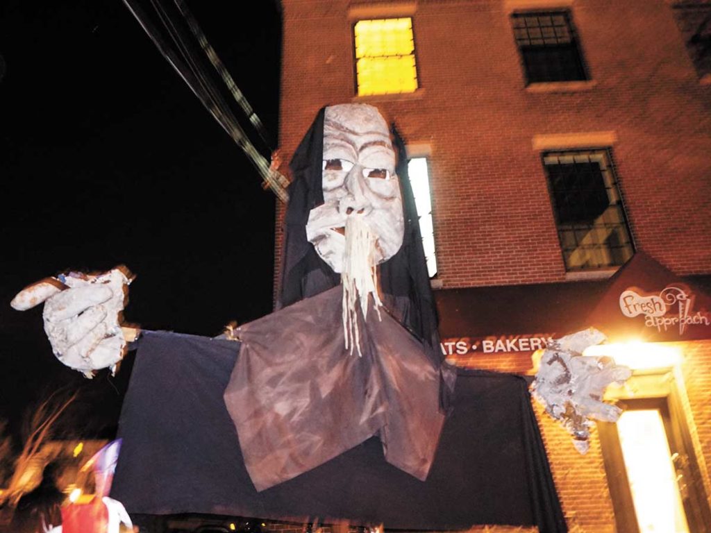 West End News - Halloween Parade - Shoestring puppet in front of Fresh Approach