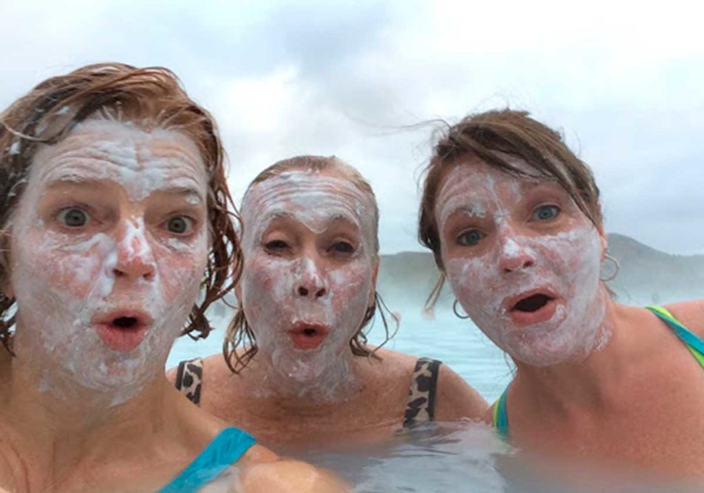West End News - Embracing warmth - facial with friends in geothermal pool - Iceland