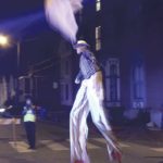 West End News - Halloween parade - stilt walker