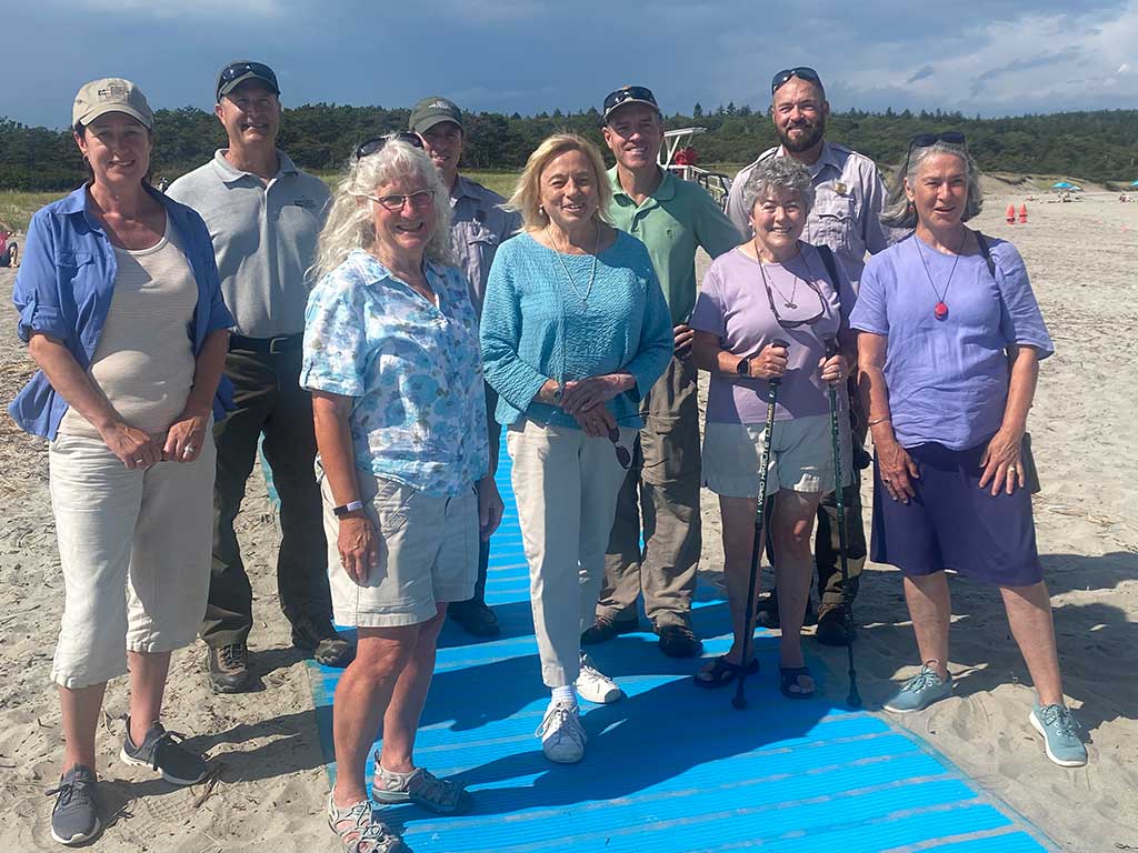 Gov Mills at Popham Beach with group and mobility pathway