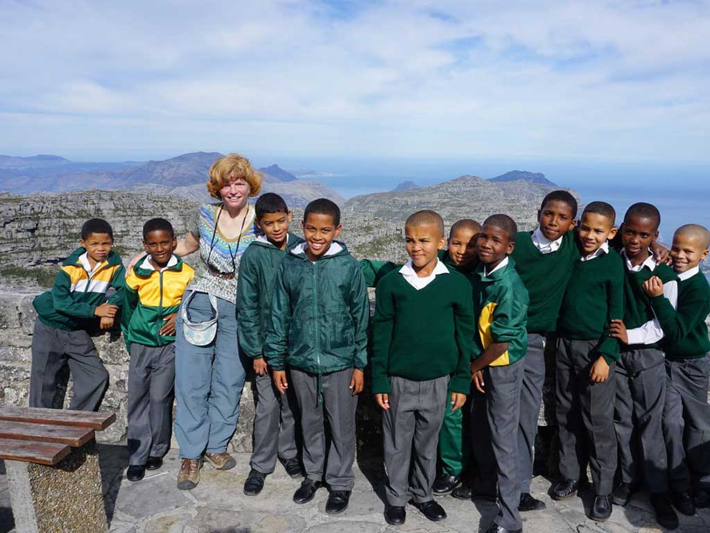 Nancy with schoolboys on top of Table Mountain