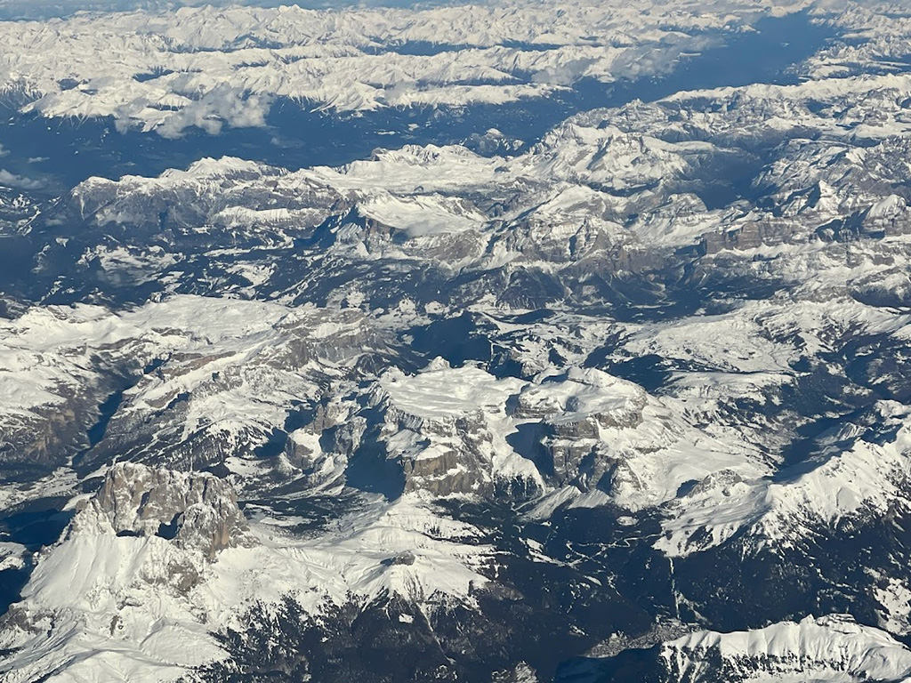 Aerial shot of Tyrolian Alps flying from Venice