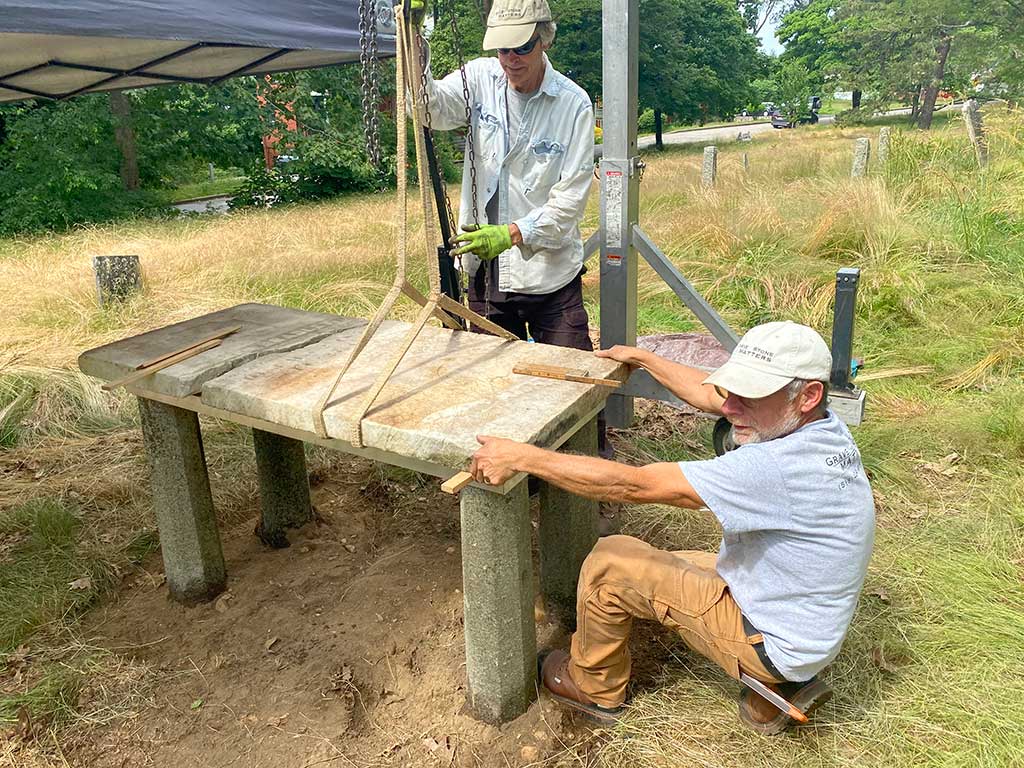 In June, Volunteers work on restoring grave markers in Portland's Western Cemetery