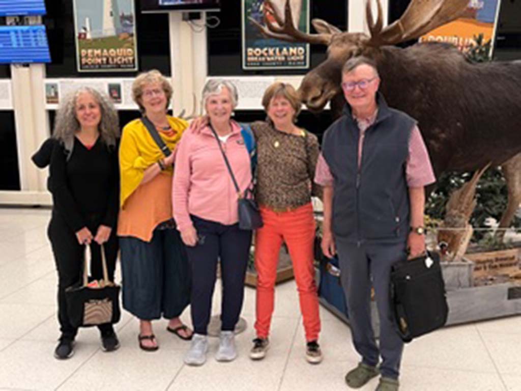 Five members from First Parish Yarmouth at Portland Jetport before traveling to Cancer Alley after the November election