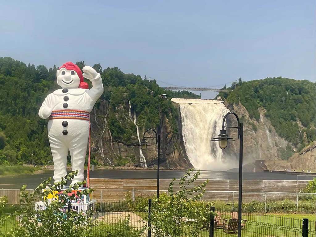 West End News - Bonhomme at Montmorency Falls