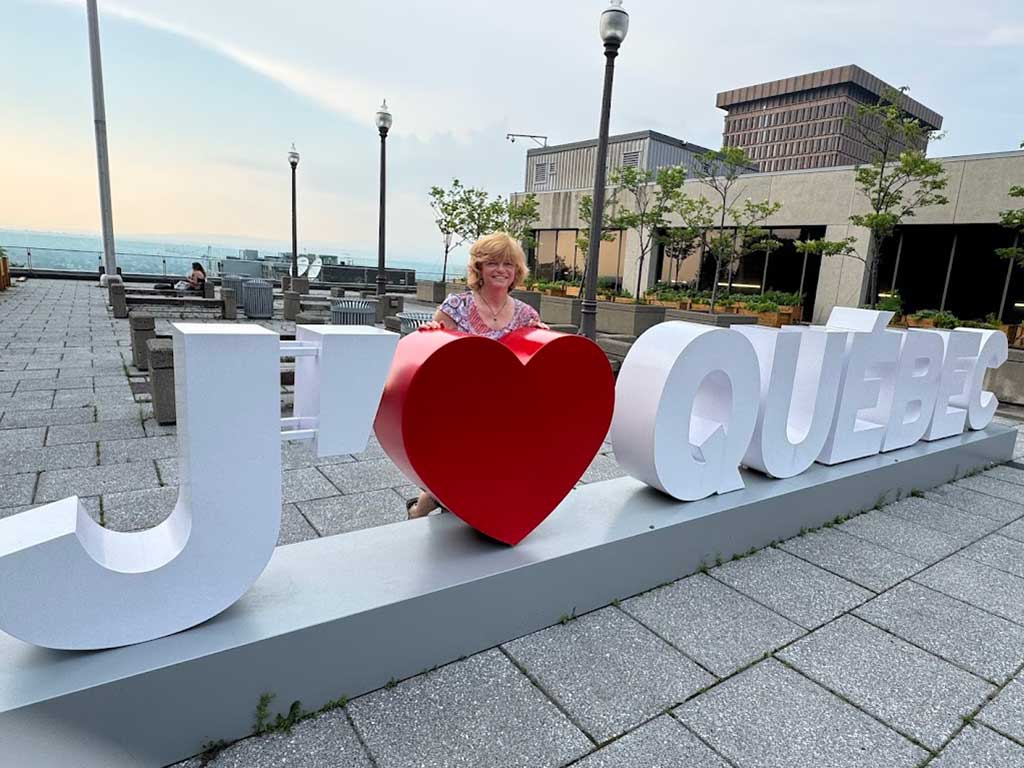 Eastern Townships and Quebec - Nancy Dorrans with J'(Heart)Quebec sign