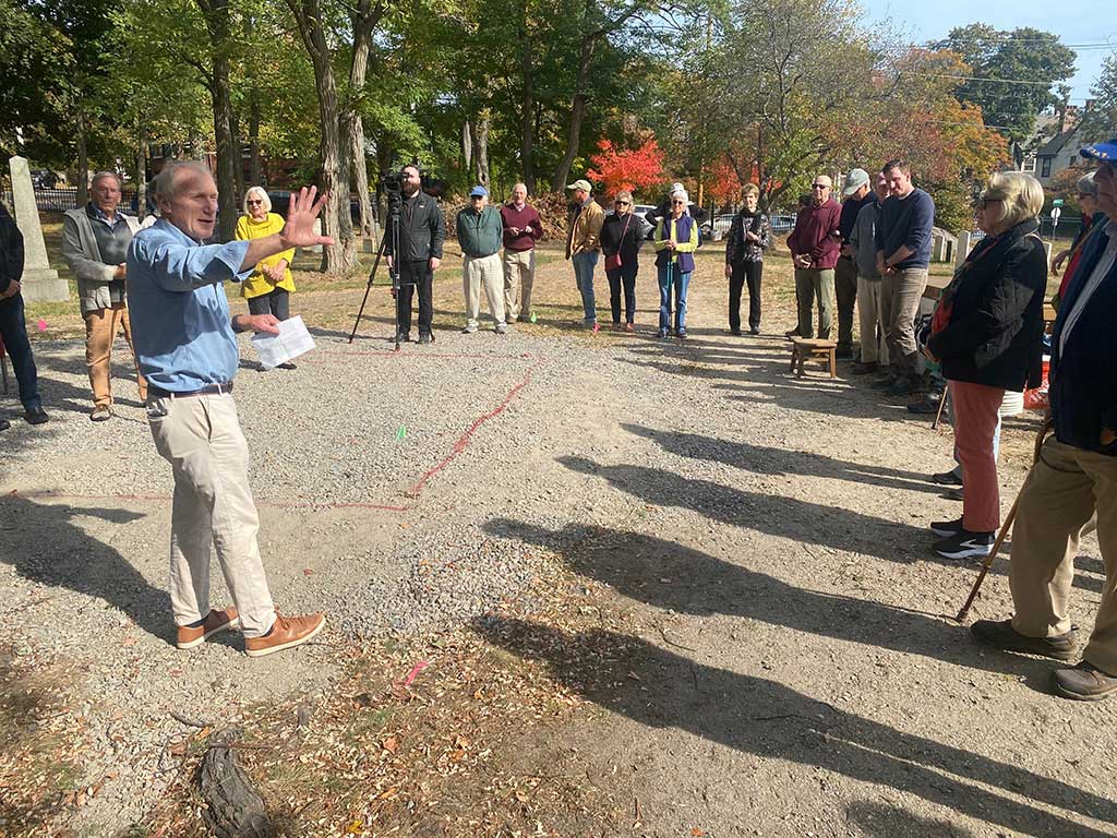 John Funk talks to volunteers and donors at the Western Cemetery