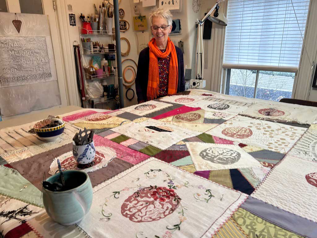 Crystal Cawley with her quilt