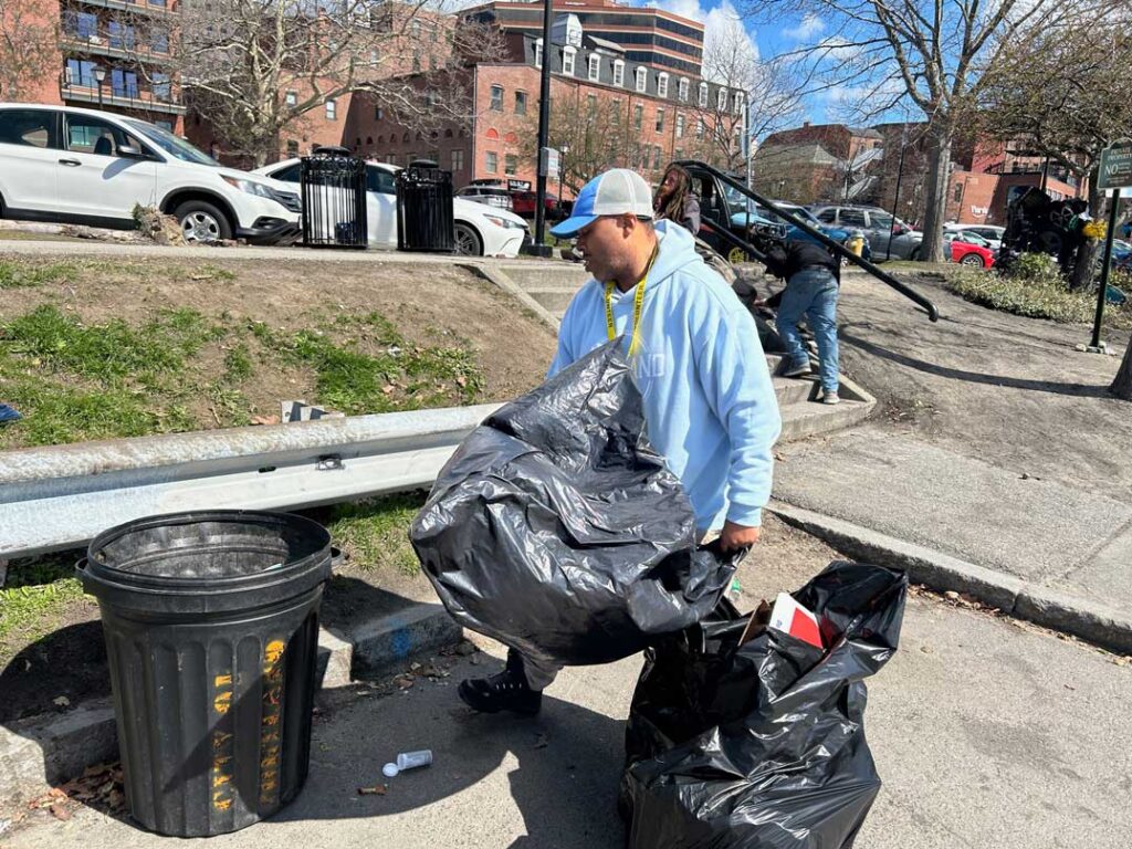 Corey Turner a Portland Downtown Ambassador cleaning up Cotton Street