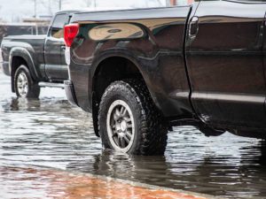 West End News - King Tide Walk - December 2017 - truck tire in flooded street