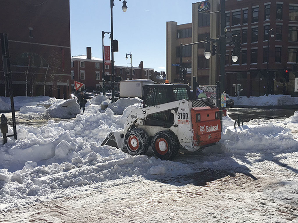 West End News - City bobcat clears snow from congress square