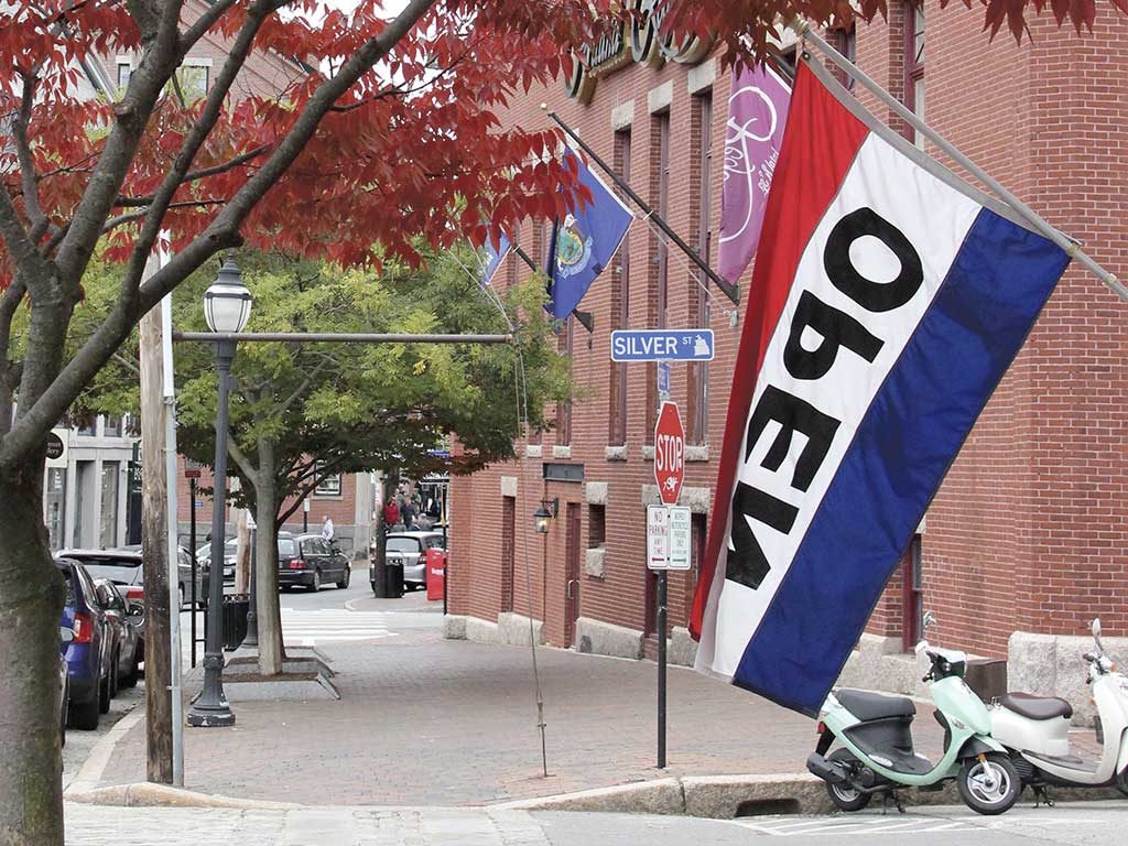 West End News - Buy Local Movement - Open flag outside Old Port establishment