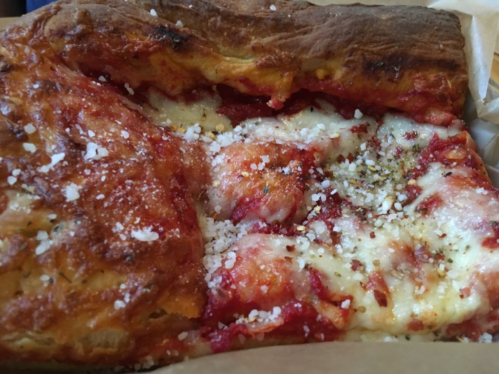 Slab: slice of Sicilian style cheese pizza.