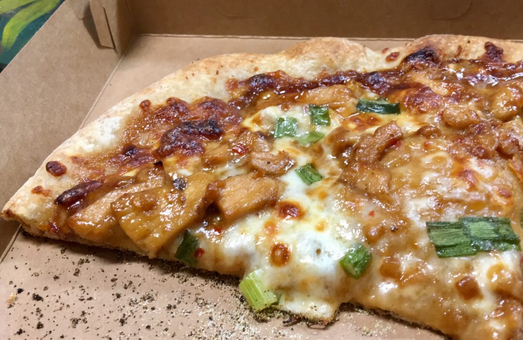 Pie in the Sky: slice of Thai chicken pizza.