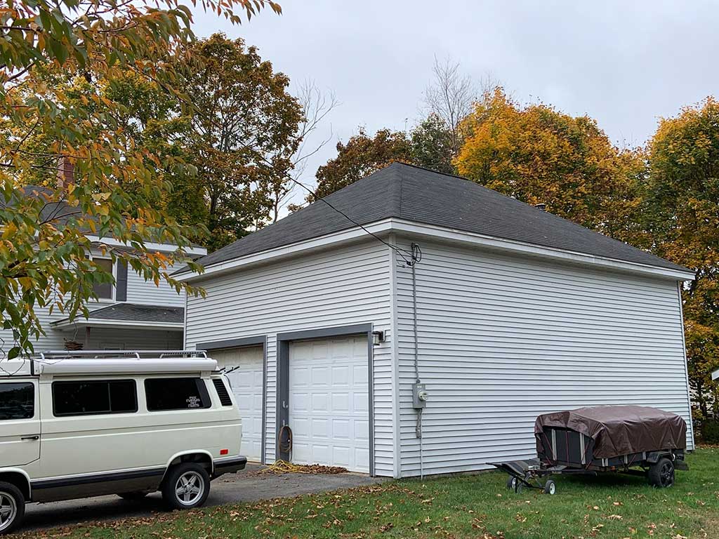 West End News - Zoning for garages over people - Photo of 2-car garage by Zack Barowitz