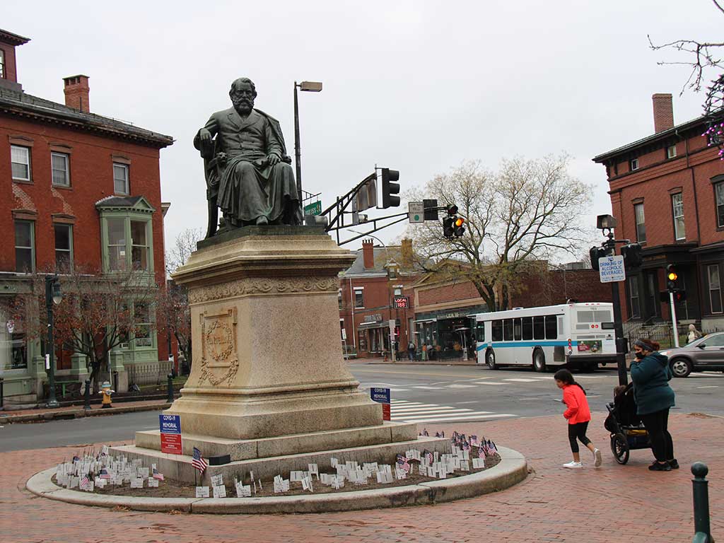 West End News - Covid-19 Memorial - passerby viewing