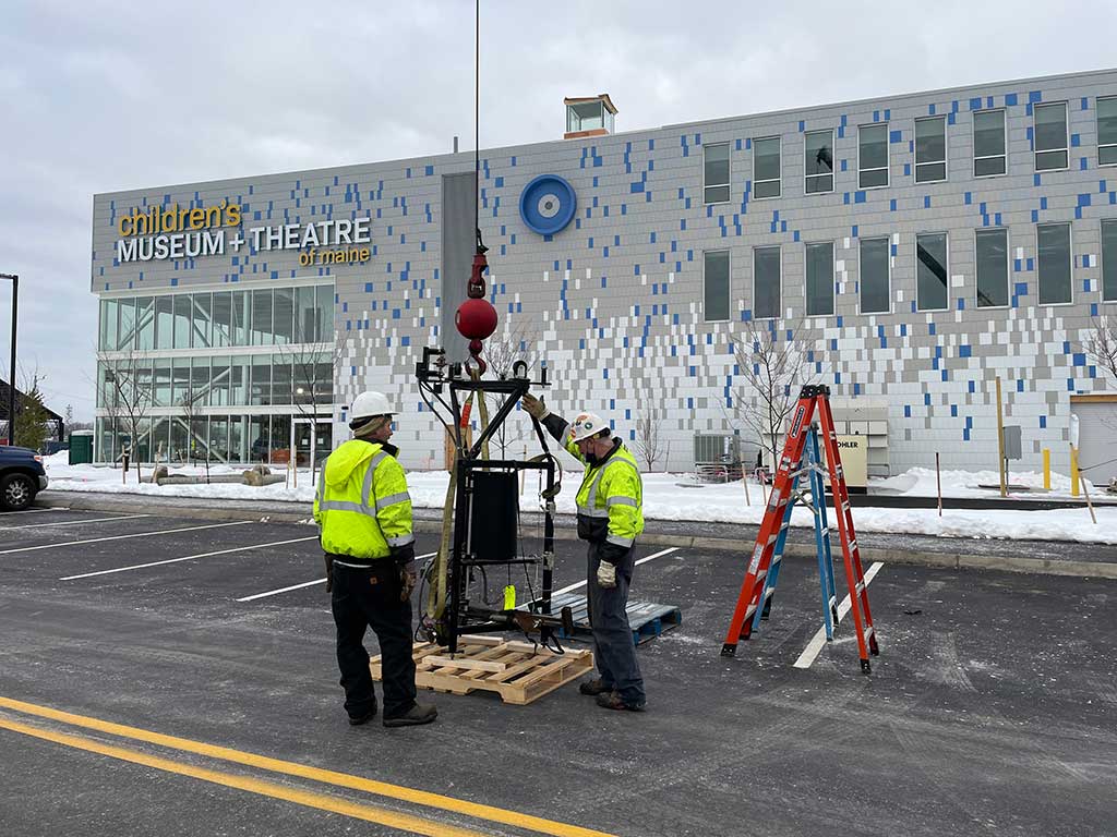 West End News - Children's Museum - workers install exhibit