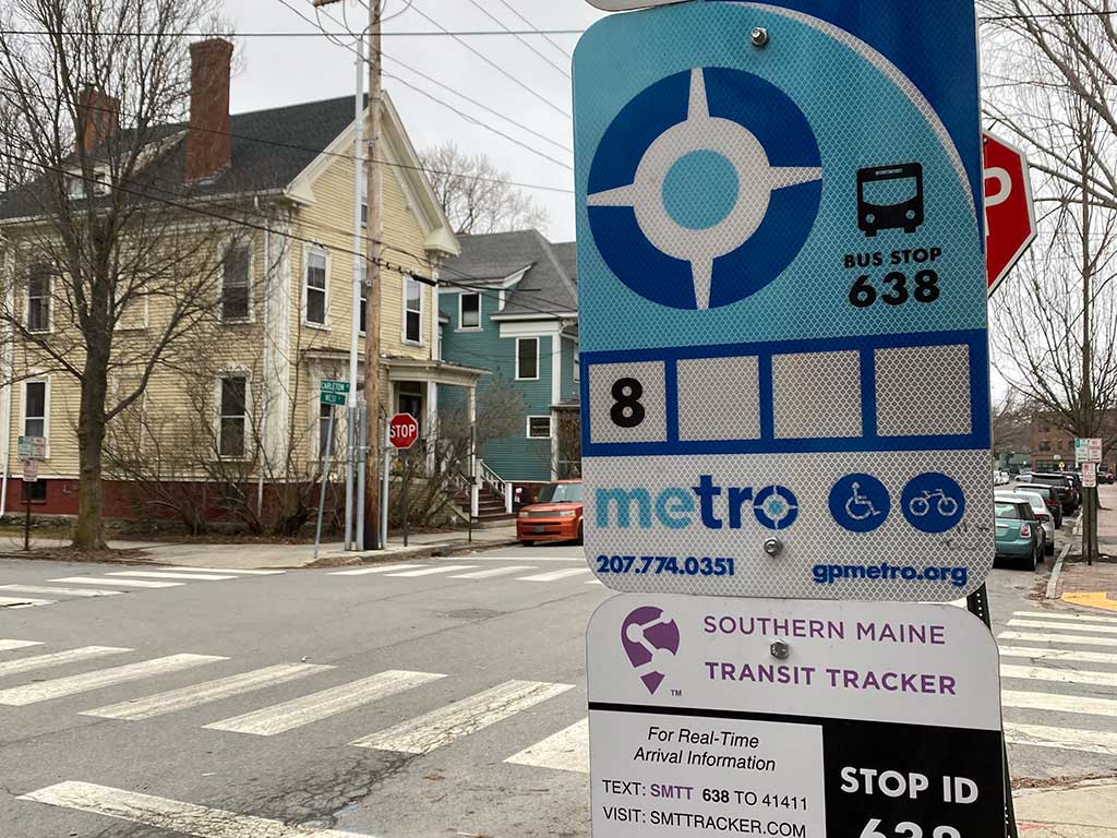 West End News - Metro Route 8 bus stop sign