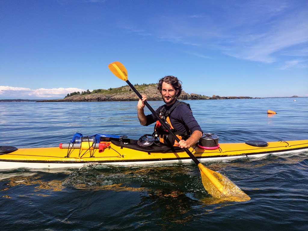 West End News - Zack Anchors of Portland Paddle in kayak enjoying his outdoorsy city of Portland, ME