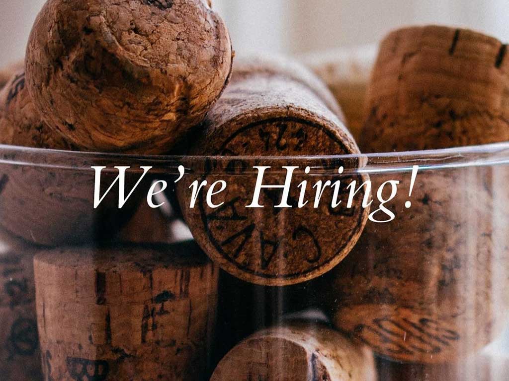 We're Hiring message over wine bottle corks - For Layne V. Witherell's Real Wine Business column - West End News, 2021