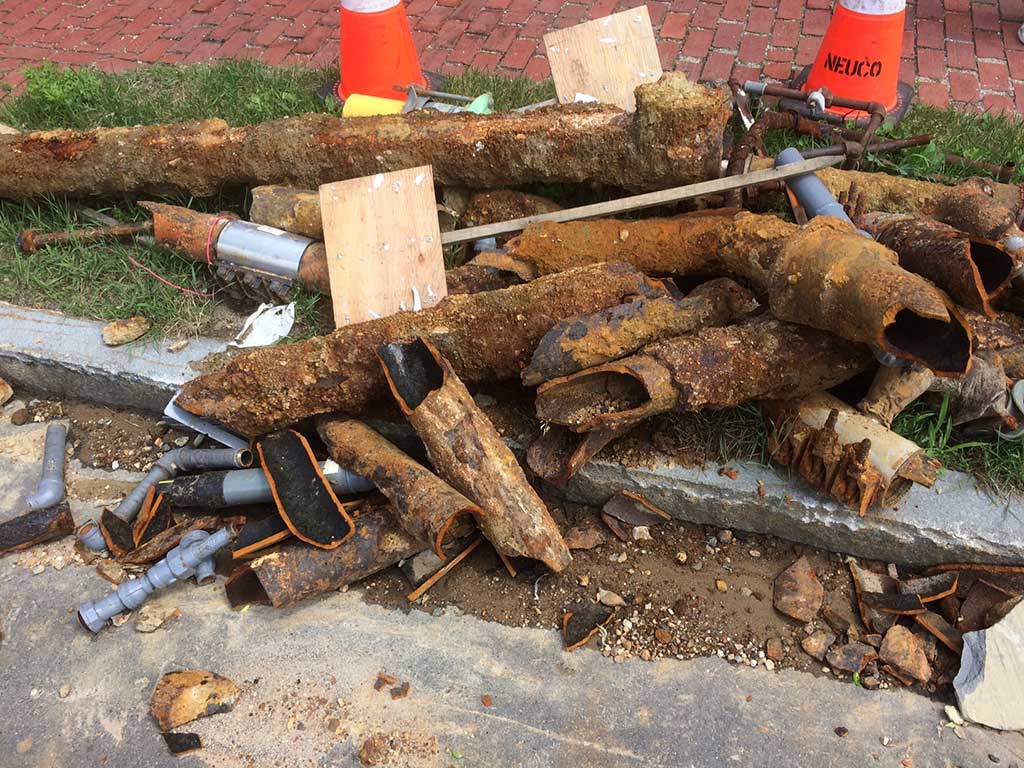 Special to West End News - Rusty pipes removed from the underground along Danforth St. -  By Steve Graef
