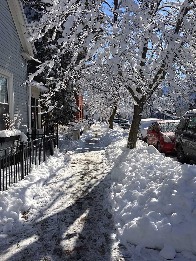 West End News - Snowy sidewalk in West End