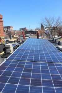 West End News - Solar panels and concrete blocks for ballast