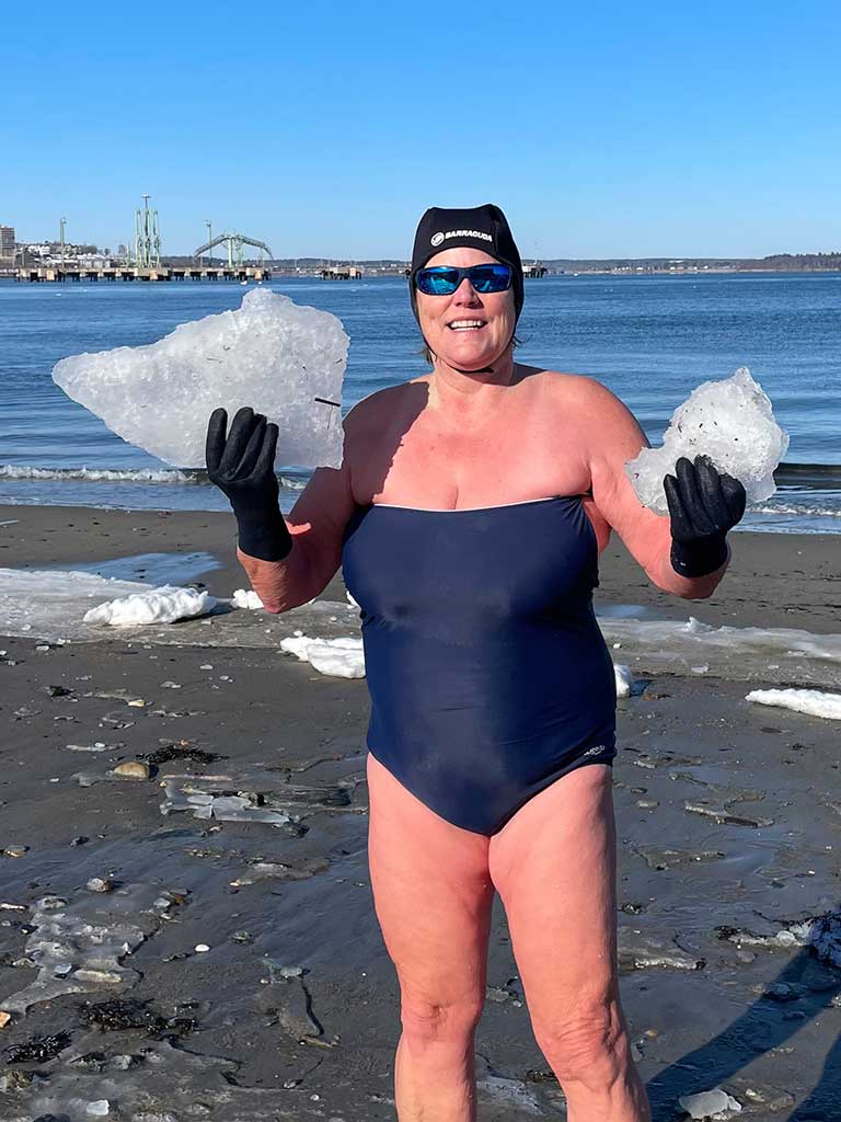 Carolyn Foley with chunks of ice at an ocean swim