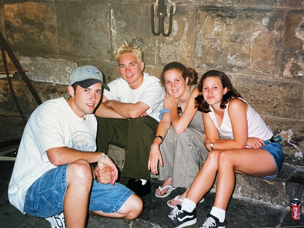 Kyle (second from left) with friends in catacombs of Italy