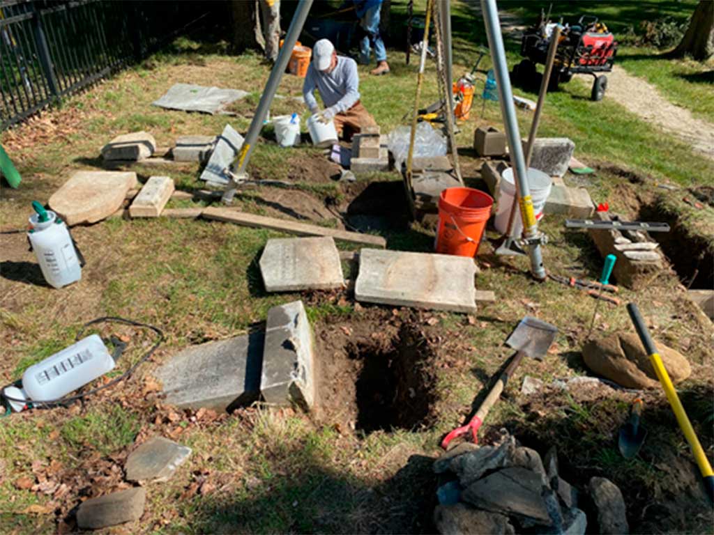 Stewards of Western Cemetery - Professional conservator Joe Ferrannini repairing the Greene family grave markers