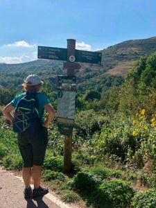 Photo of Nancy Dorrans at trail map along El Cinque Llac, Catalonia