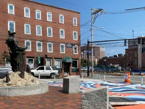 West End News - John Ford statue at Gorham's Corner with new mural, ramp, bollards