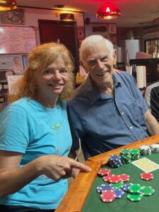 Nancy Dorrans with father playing Texas Hold'em
