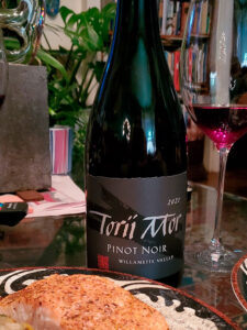 Torii Mor bottle and wine glasses from one of Layne's favorite wine shops