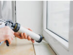 Caulking a window -very_ulissa / Adobe Stock image