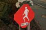 Advocates erect memorial signs to mark pedestrian deaths