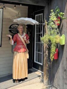 Tour guide dressed as Marie-Anne Barbell